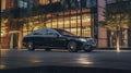 Luxury car parked outside of the building at night