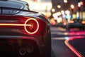 Luxury Car Tail Light Illumination at Twilight Royalty Free Stock Photo