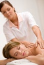 Luxury care - woman getting back massage Royalty Free Stock Photo