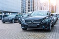 Luxury cars Mercedes-Benz C and E class parkingin a row of car store. Russia. Saint-Petersburg. 09 October 2018.