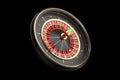 Luxury Casino roulette wheel on black background. Casino theme icon. Close-up wooden Casino roulette with a ball. Poker Royalty Free Stock Photo