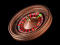 Luxury Casino roulette wheel isolated on black background. Wooden Casino roulette 3d rendering illustration.