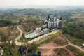 Luxury castle building resort and swimming pool on hill in village at countryside