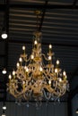 Luxury chandelier in the light bulbs hanging from the ceiling retro style Royalty Free Stock Photo