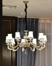 Luxury chandelier is lit up by led lamp bulbs Royalty Free Stock Photo