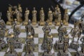 Luxury chess pieces carved in bronze in Firenze Italy Florence sculpted game board with figures peons and kings