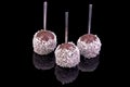 Luxury chocolate balls topped covered with coconuts, with reflection