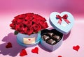 Luxury chocolates in a heart-shaped gift box and red roses, for Valentine\'s Day, copy space, Royalty Free Stock Photo