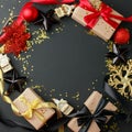 Luxury Christmas frame made of gift boxes, festive decorations, satin ribbon on black table. Christmas, happy new year background Royalty Free Stock Photo