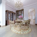 Luxury classic interior of dining room, kitchen and living room with brown furniture and crystal chandeliers Royalty Free Stock Photo