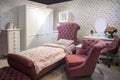 Luxury comfortable modern bedroom interior for girl in pink and white colors