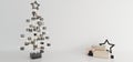 Luxury composition of gold, metallic and black glass decorations, gifts, packaging, stars and minimalistic christmas tree