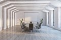 Luxury concrete and wooden meeting room interior with empty white mock up frame, window city view and daylight. Law and legal Royalty Free Stock Photo