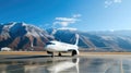 Luxury corporate business jet on runway with background of high scenic mountains Royalty Free Stock Photo