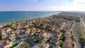 Luxury cottage town and waterfront on sunny day, real estate for rent in Cyprus