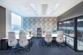 Luxury coworking office in classic interior with floor and bright city view. Interior of modern empty office building. Covid Royalty Free Stock Photo