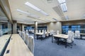 Luxury coworking office in classic interior with floor and bright city view. Interior of modern empty office building. Covid Royalty Free Stock Photo