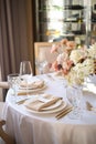 Luxury cozy autumn wedding table decoration in the restaurant. Fresh and dried flowers, roses, carnations. Beautiful table setting Royalty Free Stock Photo