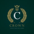 Luxury Crown calligraphic key letter `C` monogram logo Royalty Free Stock Photo