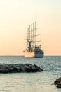 Yacht in the Mediterranean Sea at sunset, luxury travel tour, space for text, summer, ocean surface, water transport, fishing,