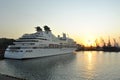 Luxury cruise ship sailing to port on sunrise Royalty Free Stock Photo