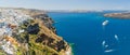 Luxury cruise ships, caldera and volcano near Fira, capital of the Greek Aegean island, Santorini, Greece. Panorama Royalty Free Stock Photo