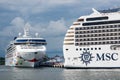 Luxury cruise ships MSC Poesia and Norwegian Star Royalty Free Stock Photo