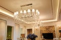 Luxury crystal chandelier lighting in villa living room Royalty Free Stock Photo
