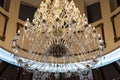 Luxury crystal chandelier. Warm shade.