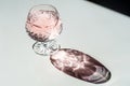 Luxury crystal glass with shampagne and its shade on a white tab Royalty Free Stock Photo