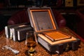 Luxury Cuban cigars in a box and alcohol Royalty Free Stock Photo