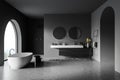 Luxury dark grey bathroom with arch window and doorway