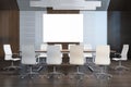 Luxury dark wood meeting room interior with  white mock up poster, furniture and daylight. 3D Rendering Royalty Free Stock Photo