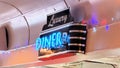 Luxury Diner Neon Sign Reflections Interior Royalty Free Stock Photo
