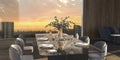 Luxury dining room with sunlight and city panorama background. Large window overlooking the sunset, table with dishes and plants. Royalty Free Stock Photo