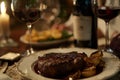 Luxury dinner served on the table with glass of red wine and grilled steak. Generative AI Royalty Free Stock Photo
