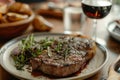 Luxury dinner served on the table with glass of red wine and grilled steak. Generative AI Royalty Free Stock Photo