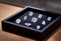 Luxury display case features various lab-grown diamonds in multiple cuts and shapes Royalty Free Stock Photo