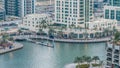 Luxury Dubai Marina canal with passing boats and promenade day to night timelapse, Dubai, United Arab Emirates Royalty Free Stock Photo