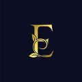 Luxury E Initial Letter Logo gold color, vector design concept ornate swirl floral leaf ornament with initial letter alphabet for