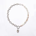 Luxury elegant baroque pearl necklace on white background