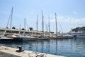 Luxury elegant yachts dropped anchor in seaport on a beautiful summer day in Monte Carlo, Monaco Royalty Free Stock Photo