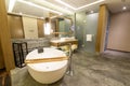 Luxury ensuite 5 star bathroom in bedroom Royalty Free Stock Photo