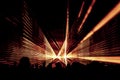 Orange laser show nightlife club stage with party people crowd Royalty Free Stock Photo