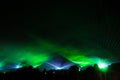 Colorful laser show nightlife club stage with party people crowd Royalty Free Stock Photo