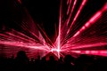 Red laser show nightlife club stage with party people crowd Royalty Free Stock Photo