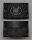 Luxury event elegant black envelope with floral design.