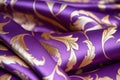 Luxury fabric in shades of purple and gold in royal theme. Royalty Free Stock Photo