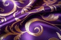 Luxury fabric in shades of purple and gold in royal theme. Royalty Free Stock Photo