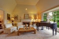 Luxury family room with grand piano and fireplace